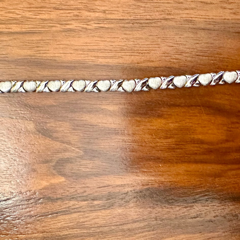 Sterling Silver heart bracelet. 7 inches. Never worn!
